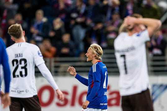 Carl Lange of Vålerenga celebrates after scoring the 2-0 goal