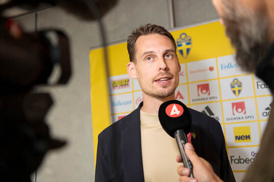 Head coach Daniel Bäckström of the under 21 Swedish national football team is interviewed by Swedish broadcaster TV4 at a press conference on October 2, 2024 in Stockholm. 
