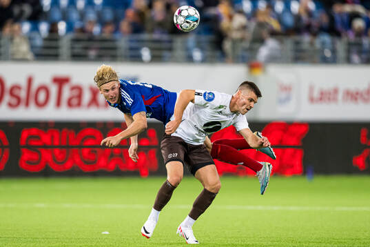 Sebastian Jarl of Vålerenga and Kristoffer Tokstad of