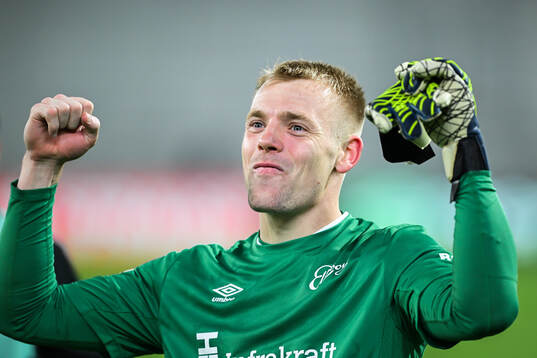 Goalkeeper Isak Pettersson of Elfsborg celebrates
