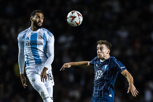 Juninho of Qarabag and Colin Rösler of Malmö FF