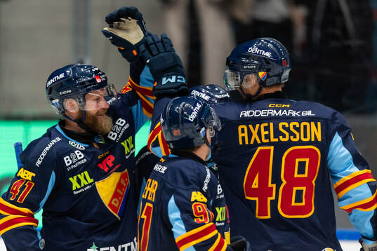 Djurgårdens Patrick Thoresen och Dick Axelsson jublar