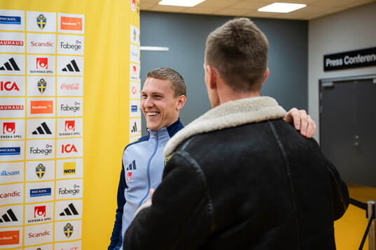 Ludwig Augustinsson and Pontus Wernbloom of the Swedish men’s national football team in a mixed zone