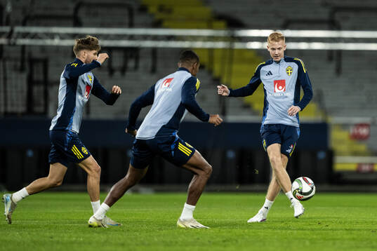 Anton Salétros, Isak Hien and Hugo Larsson of the Swedish men's football national team at a training session