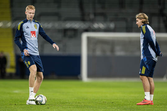 Hugo Larsson and Sebastian Nanasi of the Swedish men's football national team at a training session