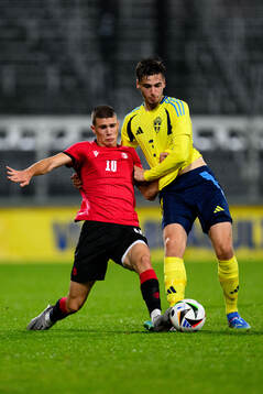 Giorgi Kvernadze of Georgia and Noah Eile of Sweden