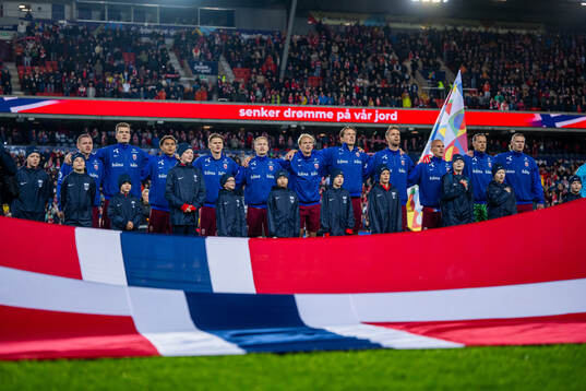 Julian Ryerson, Alexander Sørloth, Antonio Nusa, David Møller Wolfe, Andreas Hanche-Olsen, Morten Thorsby, Sander Berge, Kristoffer Ajer, Leo Østigård, goalkeeper Ørjan Håskjold Nyland and Erling Braut Haaland of Norway line up ahead of the Nations League football match between Norway and Slovenia on October 10, 2024 in Oslo. 