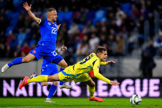 Stanislav Lobotka of Slovakia and Yasin Ayari of Sweden