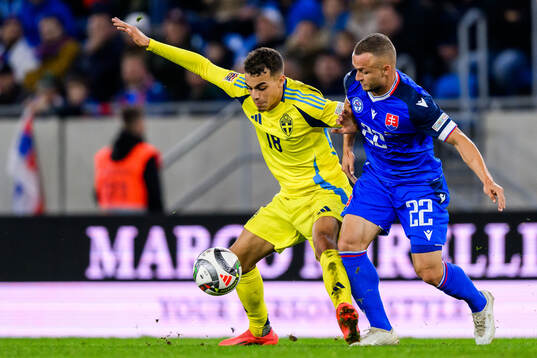 Yasin Ayari of Sweden and Stanislav Lobotka of Slovakia