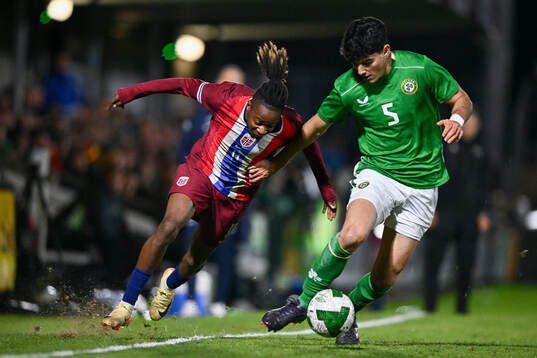 Joel Mvuka of Norway and Anselmo Garcia MacNulty of Republic of Ireland