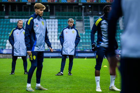 Assistant coach Remy Reijnierse and head coach Jon Dahl Tomasson of the Swedish men's national football team