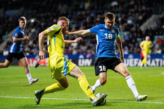 Dejan Kulusevski of Sweden and Karol Mets of Estonia