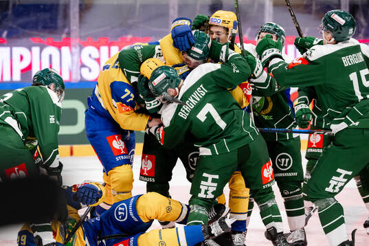 Sverre Rönningen of Storhamar and Axel Bergqvist of