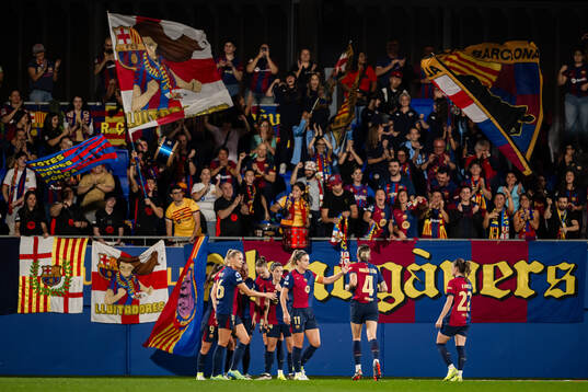 Players of Barcelona celebrate the 5-0 goal by Claudia Pina