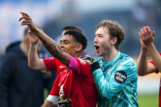 Japhet Sery Larsen and Mathias Dyngeland of Brann celebrates