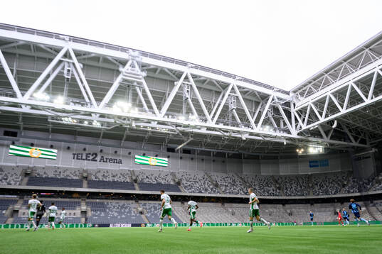 Hammarbys spelare springer in på planen