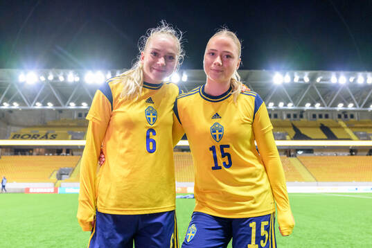 Doris Petz and Nicole Molin Kock of Sweden celebrate