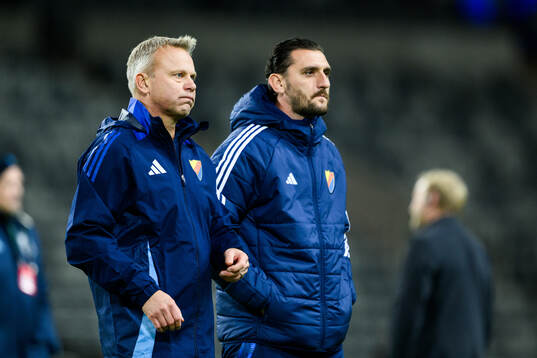 Head coach Roberth Björknesjö and assistant coach Agon Mehmeti of Djurgården look dejected