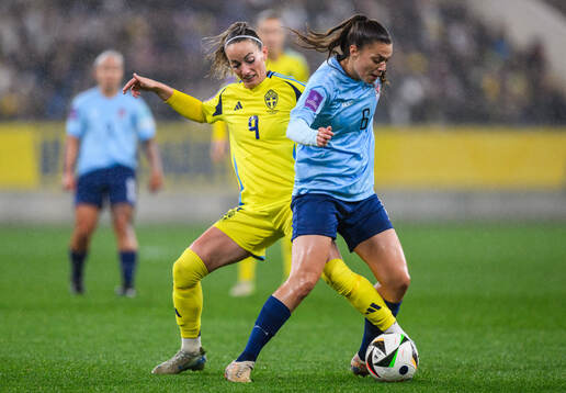 Kosovare Asllani of Sweden and Marta Estevez of Luxembourg