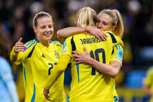 Anna Anvegård, Sofia Jakobsson and Rebecka Blomqvist of Sweden celebrate after scoring 8-0