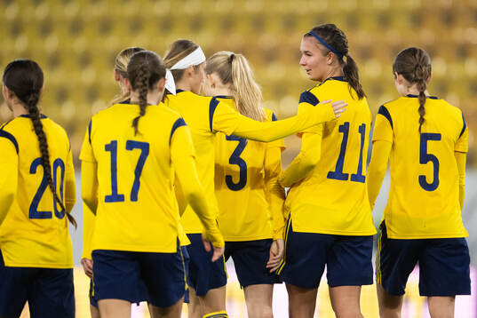 Thelma Person Welin of Sweden celebrate with teammates