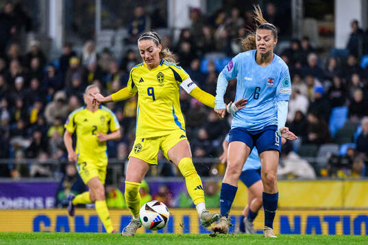 Kosovare Asllani of Sweden and Marta Estevez of Luxembourg
