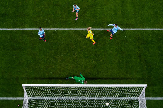 Rebecka Blomqvist of Sweden scores 8-0 behind goalkeeper