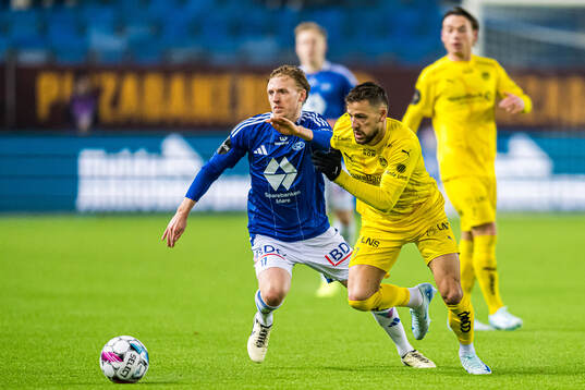 Mats Møller Dæhli of Molde and Philip Zinckernagel of Bodø/Glimt during the Eliteserien match between Molde and Bodø/Glimt on November 3, 2024 in Molde. 
