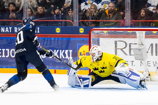Kristian Vesalainen of Finland and goalkeeper Jacob