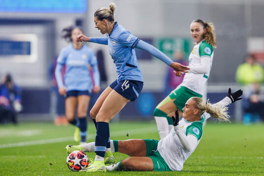 Alanna Kennedy of Manchester City and Cathinka Tandberg of