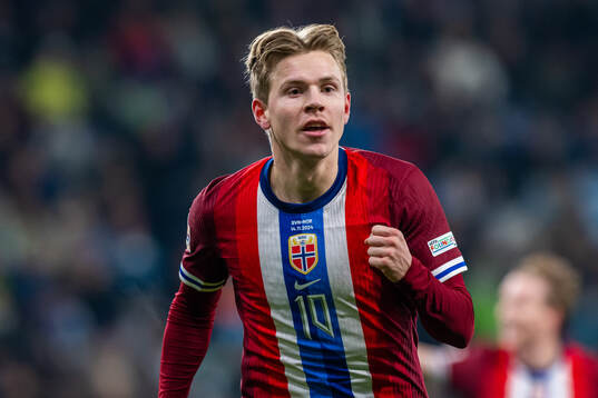 Jens Petter Hauge of Norway celebrates after scoring 1-4