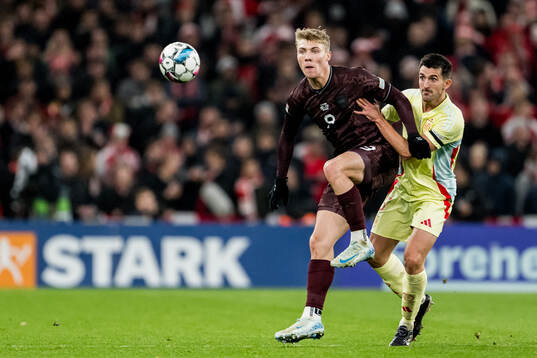 Rasmus Højlund of Denmark and Daniel Vivian of Spain