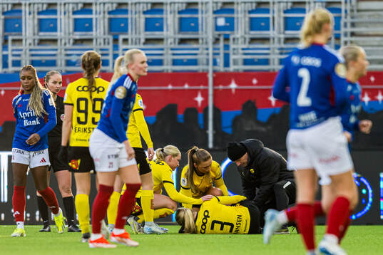 Oda Mathilde Johansen of LSK Kvinner in pain