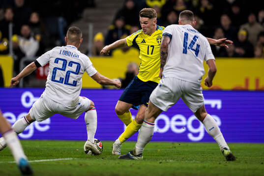 Stanislav Lobotka and Milan Skriniar of Slovakia and Viktor