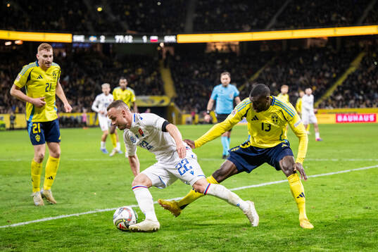 Stanislav Lobotka of Slovakia and Ken Sema of Sweden