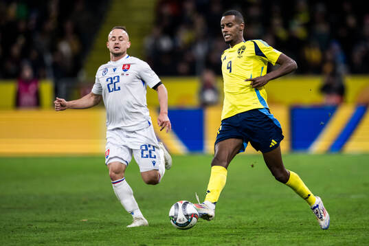 Stanislav Lobotka of Slovakia and Alexander Isak of Sweden
