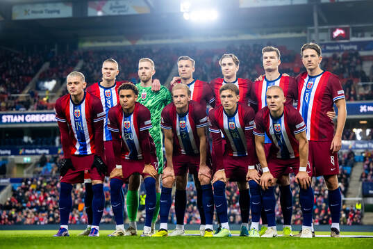 The starting eleven of Norway pose for a team photo