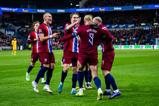 Players of Norway celebrate 1-0. By Erling Braut Haaland