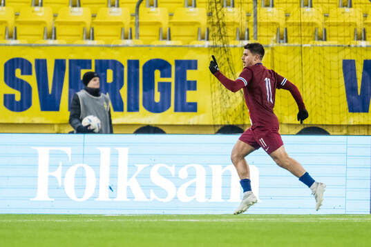 Adrian Kurd Rønning of Norway celebrates after 0-2