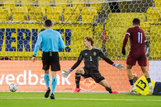 Goalkeeper William Nieroth Lundgren of Sweden and Adrian Kurd Rønning of Norway at 0-2