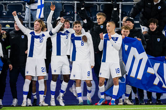 Ville Koski, Leo Walta, Adam Marhiev and Topi Keskinen of Finland celebrates