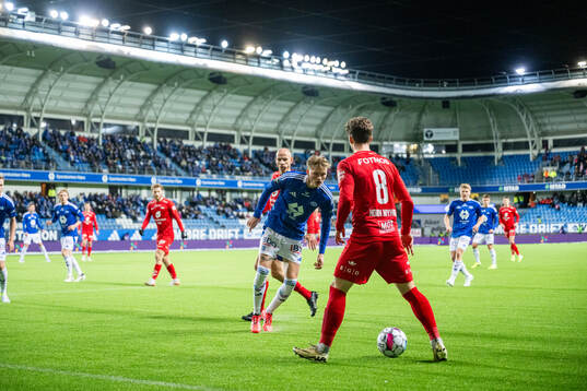 Halldor Stenevik of Molde and Felix Horn Myhre  of Brann