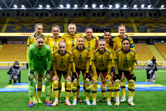 The starting eleven of Sweden poses for a team group photo