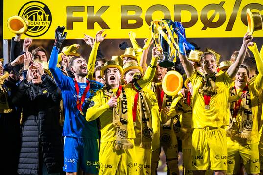 Nikita Haikin, Patrick Berg, Ulrik Saltnes and Sondre Brunstad Fet of Bodø/Glimt celebrates with the trophy