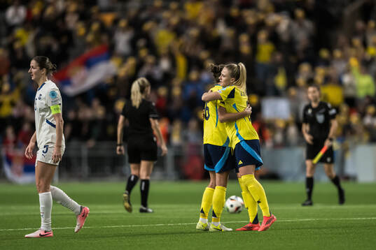 Filippa Angeldahl and Rebecka Blomqvist of Sweden celebrating