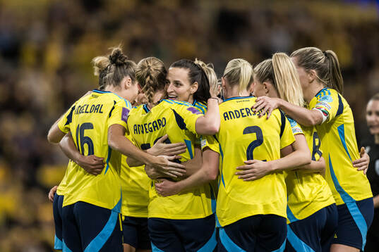 Anna Anvegård and Nathalie Björn of Sweden celebrate after the 6-0 goal