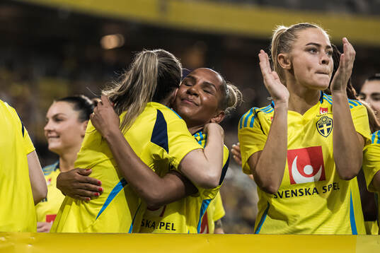 Madelen Janogy of Sweden celebrates