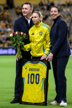 Jonna Andersson of Sweden is celebrated for 100 games with Head of football Kim Källström and General secretary Andrea Möllerberg of the Swedish Football Association ahead of the UEFA Women's Euro Qualifier play-off football match between Sweden and Serbia on December 3, 2024 in Stockholm. 
