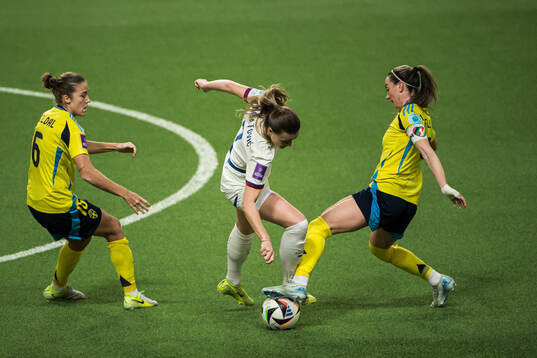 Filippa Angeldahl of Sweden, Milica Mijatovic of Serbia and Kosovare Asllani of Sweden