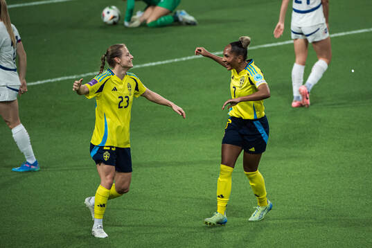 Anna Anvegård and Madelen Janogy of Sweden celebrating the 6-0 goal